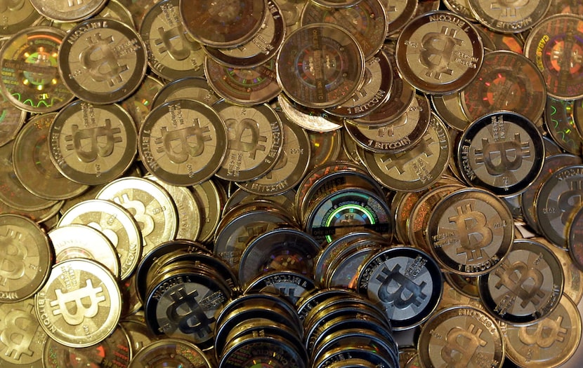 ARCHIVO - Los tokens de Bitcoin se ven el 3 de abril de 2013 en Sandy, Utah. (Foto AP/Rick Bommer, archivo)